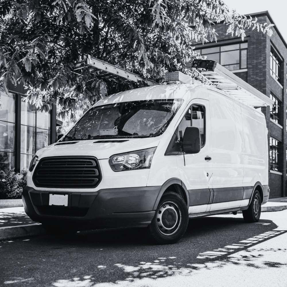 Field service van representing GPS fleet tracking, dispatch, and vehicle management with Data Miler