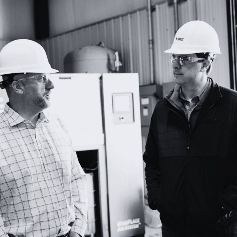 Direct Automation engineers discussing advanced process control and optimization