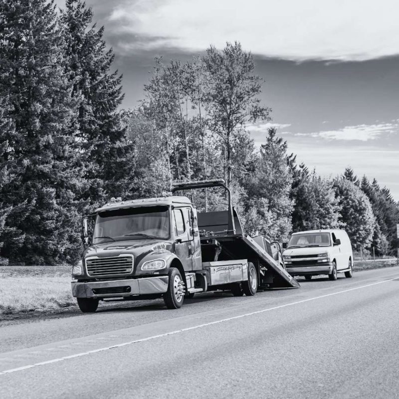 Commercial service vehicles on the road supported by Data Miler fleet tracking and field operations.