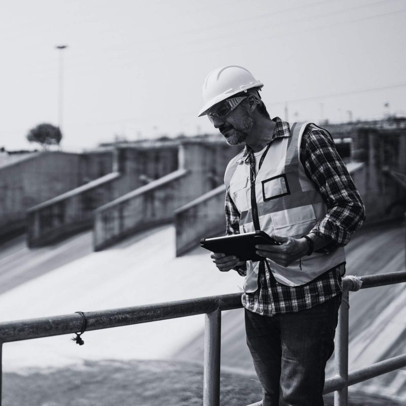 Water utility operator reviewing system information at a treatment facility